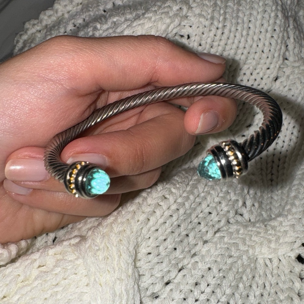 Two tone silver bracelet with blue stones